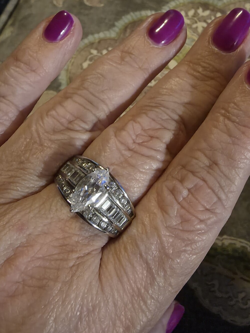 Elegant Platinum Over Silver Cubic Zirconia Marquise Ring.